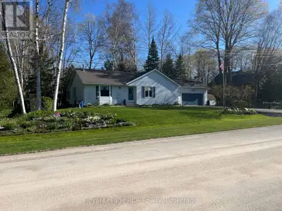 This Huron Woods home is situated on a corner lot and has been beautifully maintained by the same ow...