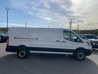 Focused on utility and economy, this Ford Transit is a strong contender in the work van market. This... (image 3)