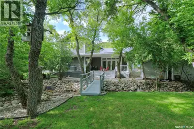 Your dream come true lake home invites you to call 662 Valley Drive in South Lake at Buffalo Pound L...