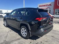 Ready for adventure and the everyday commute, this 2024 Toyota RAV4 LE, presented in striking Midnig... (image 7)