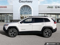 Discover seamless navigation and breathtaking open-air experiences in this Bright White 2017 Jeep Ch... (image 2)