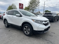 The 2019 Honda CR-V LX in stunning Platinum White Pearl combines versatility and efficiency, making... (image 2)