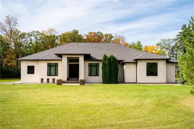 R13//St Andrews/Nestled on 1.81 acres along historic River Road, this custom bungalow is a masterpie...