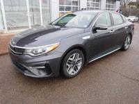 SUPER CLEAN, 1 OWNER TRADE IN! THIS PLUG IN HYBRID HAS EXCEPTIONAL FUEL ECONOMY AND IS A VERY COMFOR... (image 1)