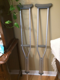Crutches aluminum adjustable nice and light in good condition