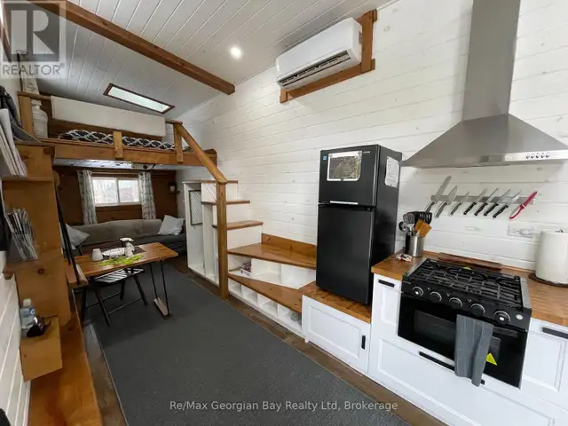 91.5 KING ROAD Tay (Waubaushene), Ontario in Houses for Sale in Barrie - Image 4