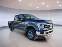 // EXCELLENT CONDITION! // Meet the 2022 Ford Super Duty F-350 SRW Lariat, now offered at Centennial... (image 2)