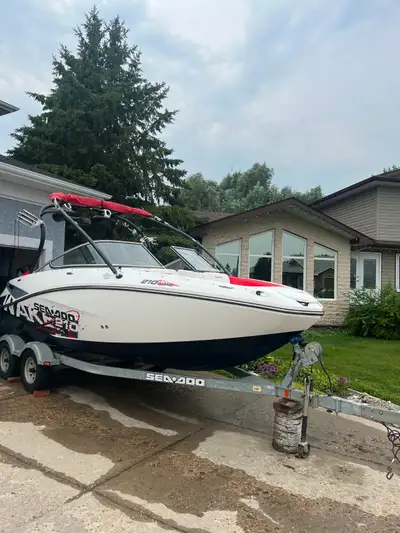 Twin 215 HP motors Regular maintenance completed 260 hours Located near Yorkton; Good Spirit Lake