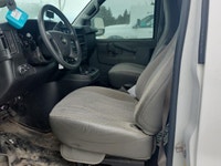 The 2017 Chevrolet Express Cargo Van in a classic white, rear-wheel drive design is tailored for tho... (image 9)