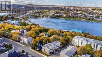 LOCATED ADJACENT TO QUIDI VIDI LAKE ON A QUIET STREET , this townhouse condo has a lot to offer with...