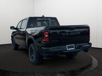 This 2026 RAM 1500 REBEL CREW CAB 4X4 has the following options Lux Leather Trimmed Bucket Seats, Re... (image 3)