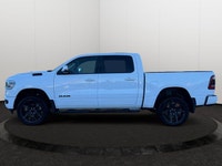 This Ram 1500 is equipped with: Cloth/Vinyl Bucket Seats, Remote Start, Heated front seats, Heated S... (image 2)