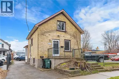 Welcome to this well-maintained 1.5-storey home, ideally located close to schools, downtown Kitchene...