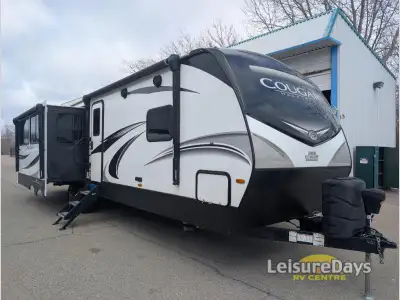 Keystone Cougar Half-Ton travel trailer 32RLI highlights: Insulated Slide Floors Dual Awning 12V hea...