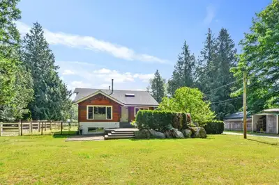 Immaculate, updated split-entry (panabode-style) home on flat, usable land! Featuring 4 bedrooms (2...