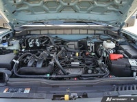 Explore the rugged charm of this 2022 Ford Bronco Big Bend, boasting a sleek Area 51 exterior and on... (image 7)