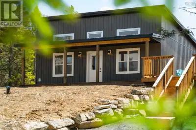 Newly completed 2 bedroom 1 bath new construction located in Oyster Pond! This mid-century modern st...