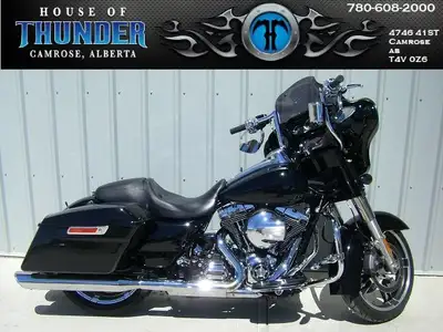 Take command of the road with this 2014 Street Glide Special Harleys best-selling touring bagger tha...