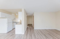 Amenities: Upgraded Kitchens • In-suite Laundry • Dishwasher Suite & Building: Two level, three-bedr... (image 6)