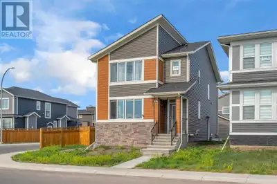 Welcome to this stunning brand-new 2-storey home in the heart of Midtown, Airdrie! Situated on a cor...