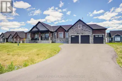 Welcome to this stunning custom-built bungalow located in the highly sought-after Bethany Village. S...