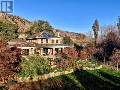 Beautiful private 11.56 acre riverfront French country estate being offered for sale. Tucked well in...