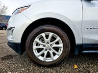 Presenting the 2019 Chevrolet Equinox LT, a sophisticated gray AWD SUV that promises excellent handl... (image 4)