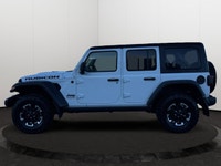 This 2025 JEEP WRANGLER 4-DOOR RUBICON has the following options Cloth Low-Back Bucket Seats, Remote... (image 1)
