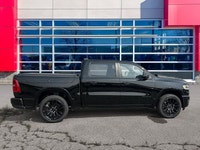 This Ram 1500 has a trusty Twin Turbo Premium Unleaded I-6 3.0 L/183 engine powering this Automatic... (image 7)