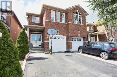 Main and Upper Level Only Spacious 4-Bedroom, 3-Bathroom Semi-Detached Home for Lease. This generous...