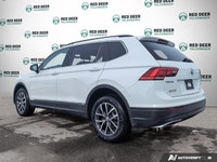 The pre-owned 2021 Volkswagen Tiguan Comfortline is a versatile and well-equipped SUV designed for d... (image 4)