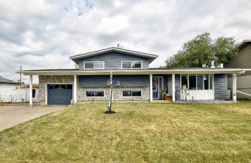 Beautifully updated home on 2 lots in Wembley Houses for Sale