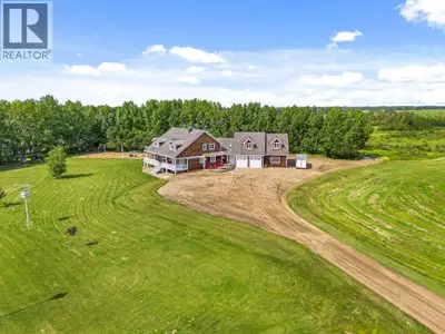 One of a kind- both in its location as well as the design of the home, size and Huge garage which is...