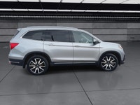 The 2021 Honda Pilot Touring 8-Passenger AWD in Silver is an exceptional choice for those seeking a... (image 8)