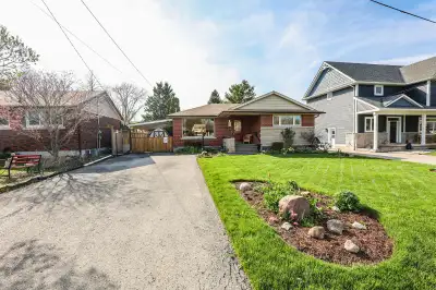 FOR SALE - STROLL TO THE LAKE … Nestled at 29 Old Orchard Avenue in Grimsby, just a short walk to se...