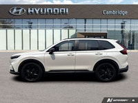 The 2026 Honda CR-V Hybrid Touring isn't just an SUV; it's your efficient and sophisticated partner... (image 1)