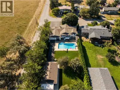 Welcome to this exceptional Kamloops property set on a rare half-acre corner lot, offering the perfe...