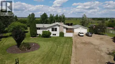 This is an acreage you’ll want to see! Nestled on 2.45 beautifully maintained acres just minutes fro...