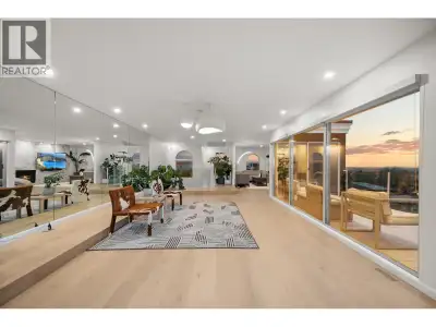 Discover a rare blend of style, comfort, and panoramic beauty in this North Burnaby showpiece. Frame...