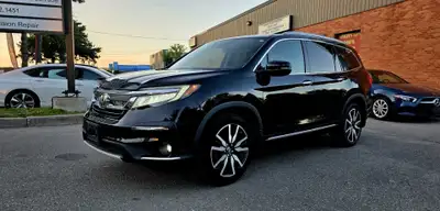 Air Conditioning, Power Folding Mirrors, Leather Seats, 3rd Row Seating, Adjustable Steering Wheel,...