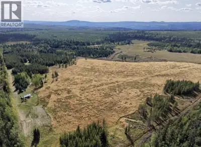 Embrace the freedom of rural living on 140 private acres, surrounded by Crown land and endless outdo...