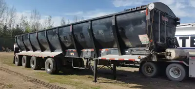 Trailer is a Temisko NOT a Trout River, 48', 4 axle, hydraulic friction drum driven belt, no chains...