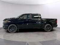 Presenting the stunning 2026 Ram 1500 Sport in an elegant black finish, equipped with a robust 4x4 d... (image 1)