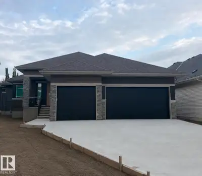 Brand-new executive bungalow by Oak Line Homes offering approx. 1,700 sq. ft. above grade with 4 bed...