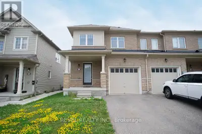 Welcome to this beautifully maintained end-unit townhouse, offering 1,709 above-grade square feet of...