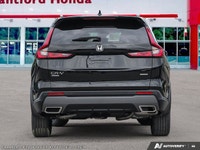 The 2026 Honda CR-V Hybrid Touring in stunning Crystal Black Pearl elevates the standard for sophist... (image 4)