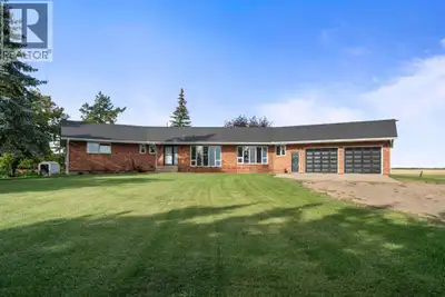 Looking for an acreage only minutes out of town? Here it is! This stunning large bungalow with just...