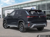 This Volkswagen Tiguan has a trusty Intercooled Turbo Regular Unleaded I-4 2.0 L/121 engine powering... (image 5)