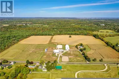 54.99 acres more/less in prestigious Carlisle on natural gas, Bell fibe underground to the house, an...