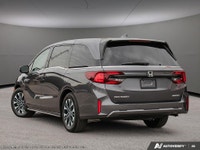 The 2026 Honda Odyssey Touring van in elegant Gray, complemented by a reliable automatic transmissio... (image 3)